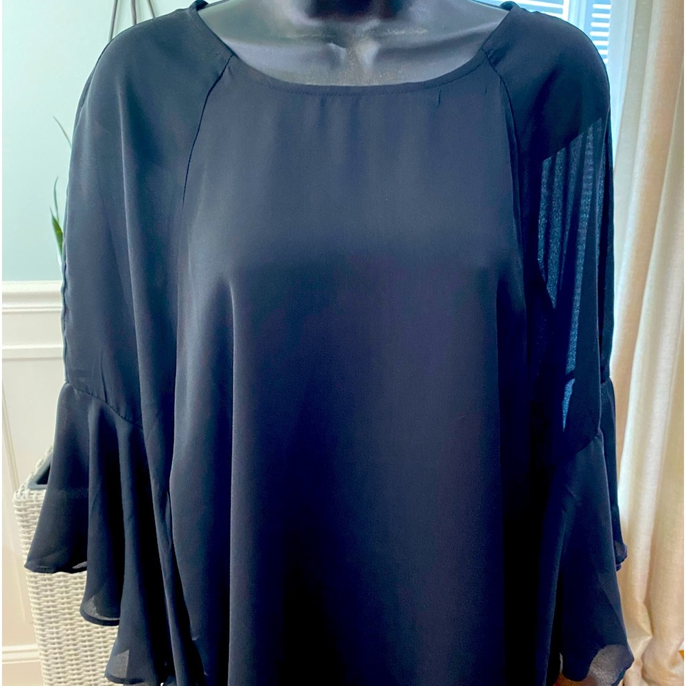 Black blouse.